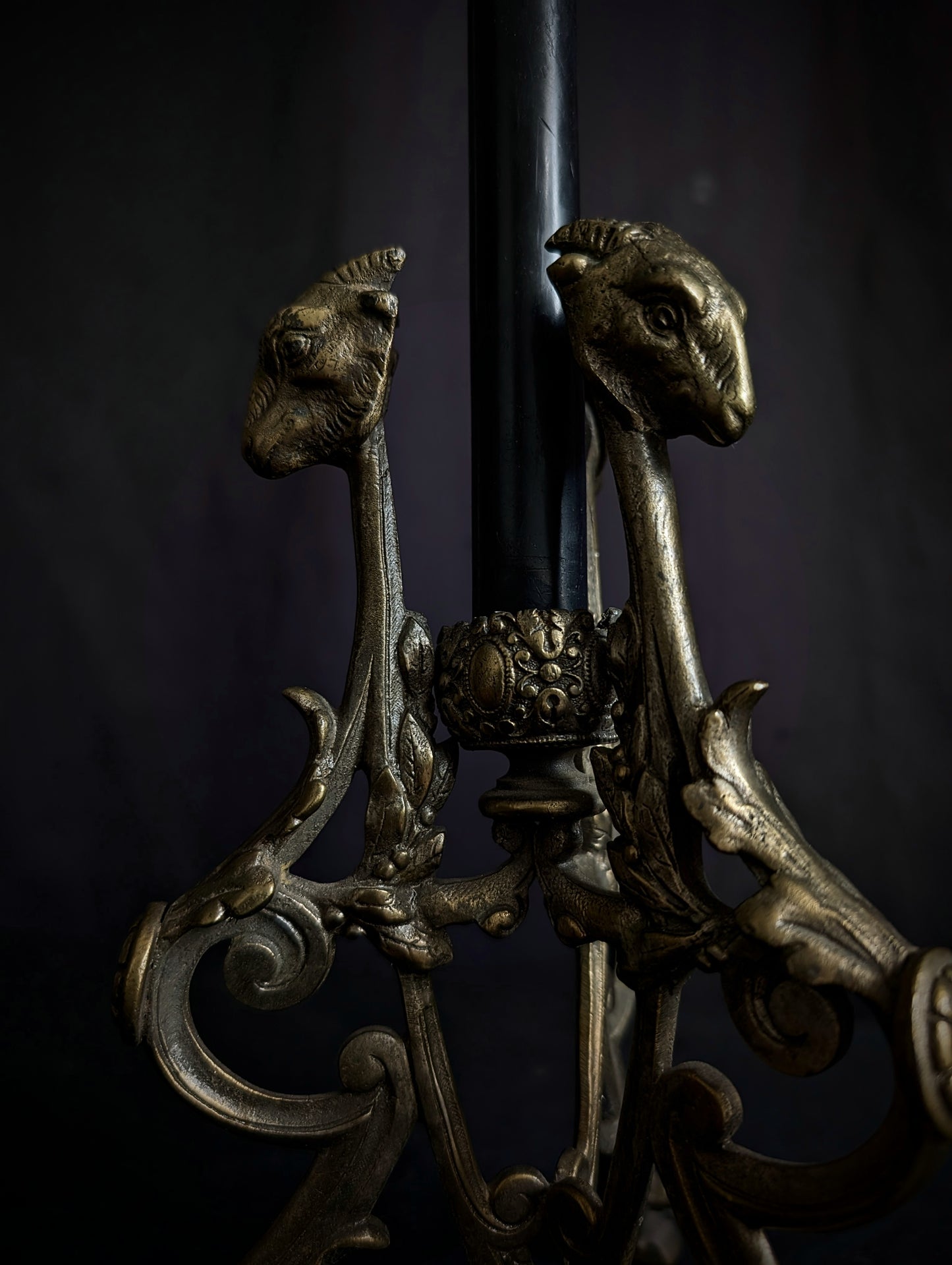 Antique candlestick with goats
