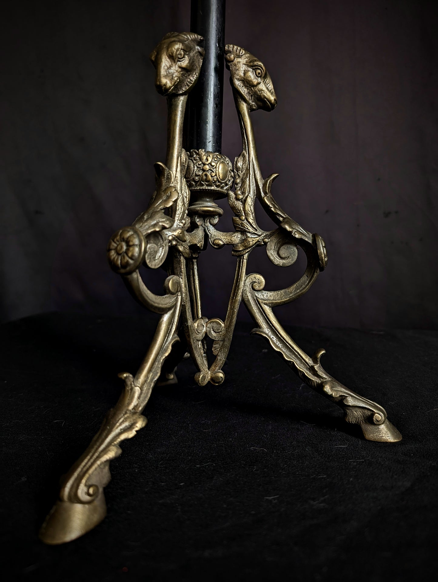 Antique candlestick with goats