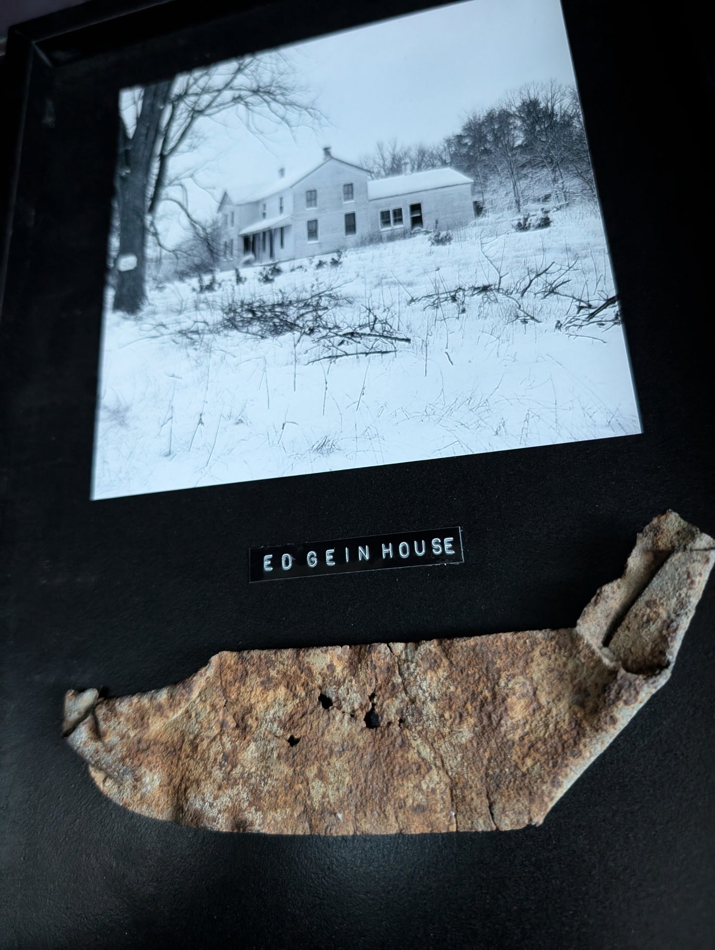 Piece of ED GEIN's infamous Plainfield farm in a frame with photo