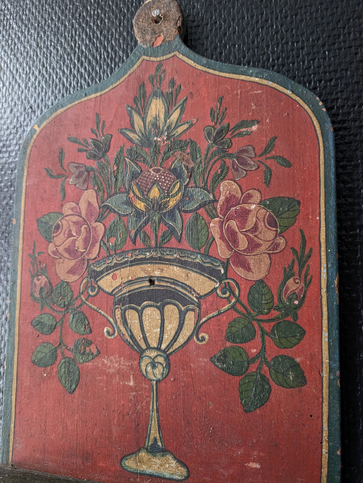 Sectioned skull from a private collection belonging to a doctor in Germany, 1915. Displayed on an antique Alpine folk art painted wooden wall shelf (Bauernmalerei)