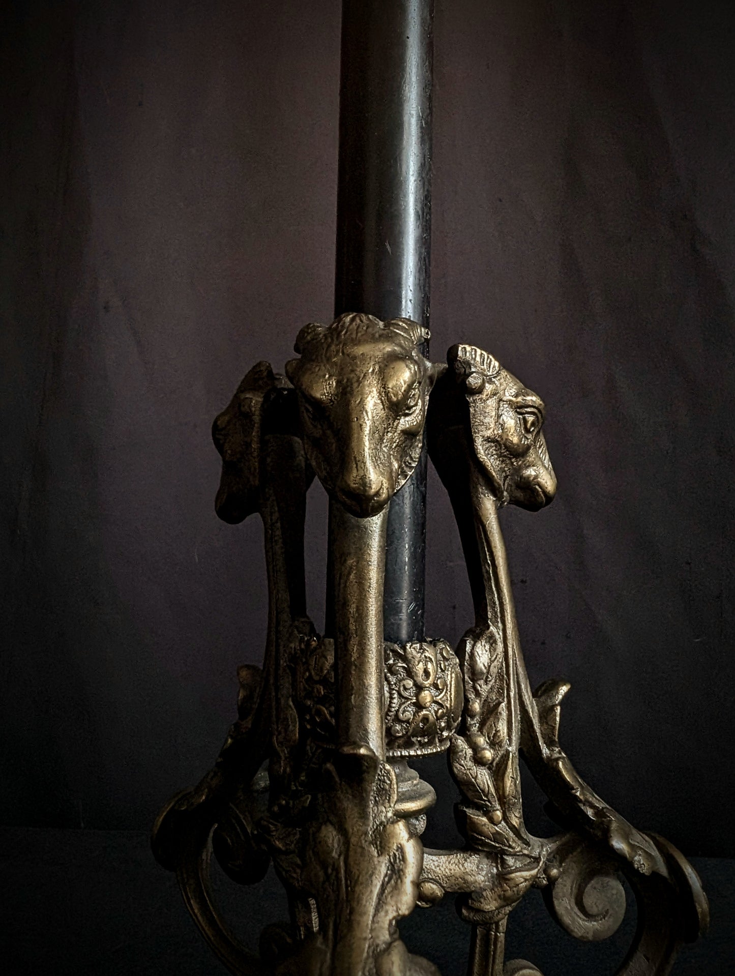Antique candlestick with goats