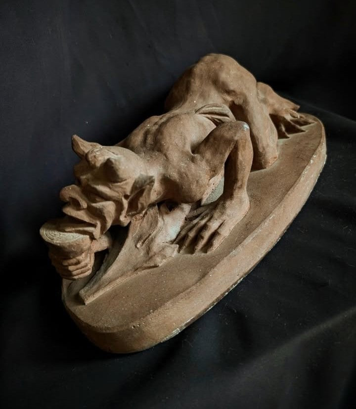 Sculpture of the Devil with a chalice (made of church stone)