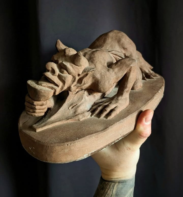 Sculpture of the Devil with a chalice (made of church stone)