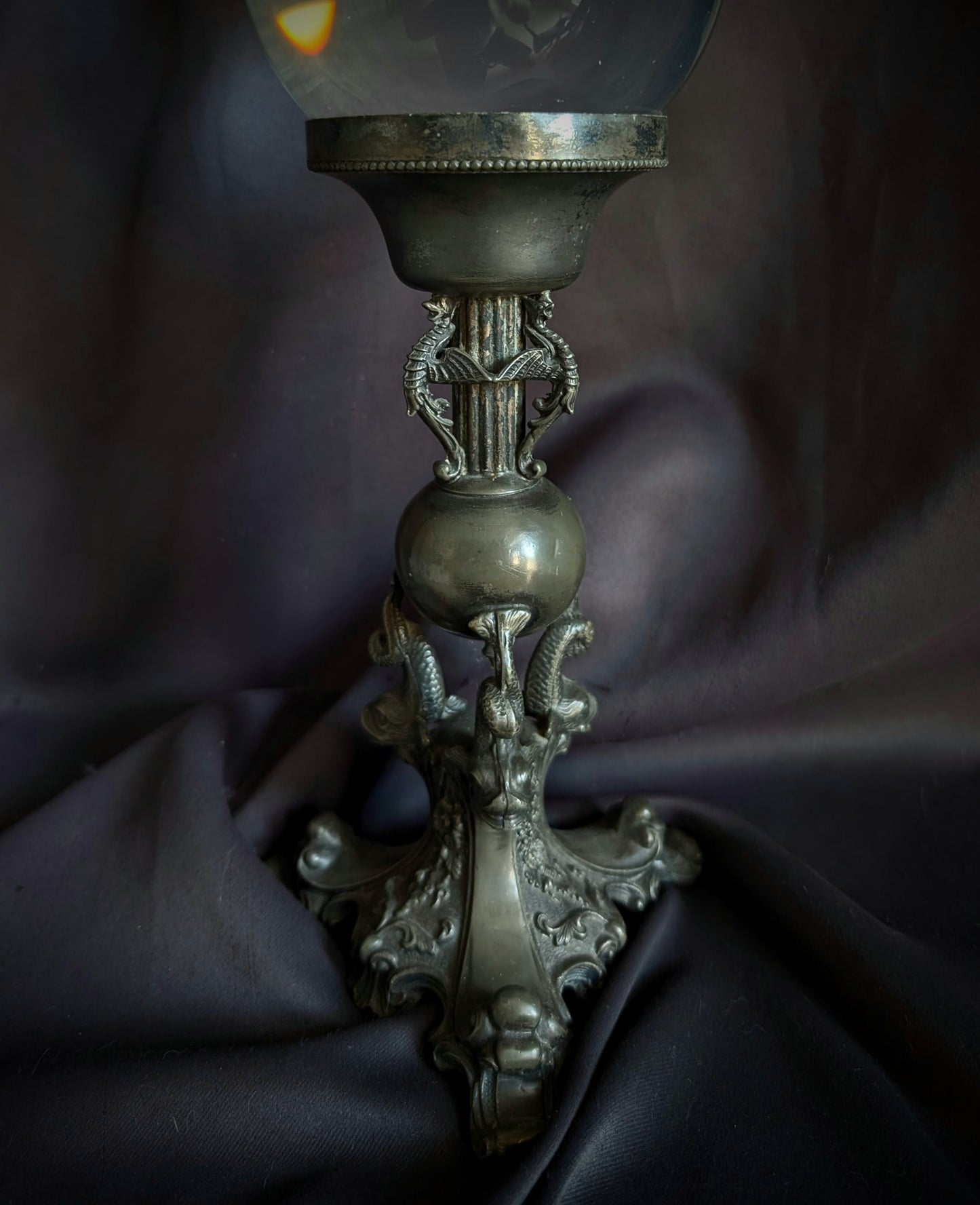 A beautiful crystal ball on a pedestal with Chimeras (30cm)