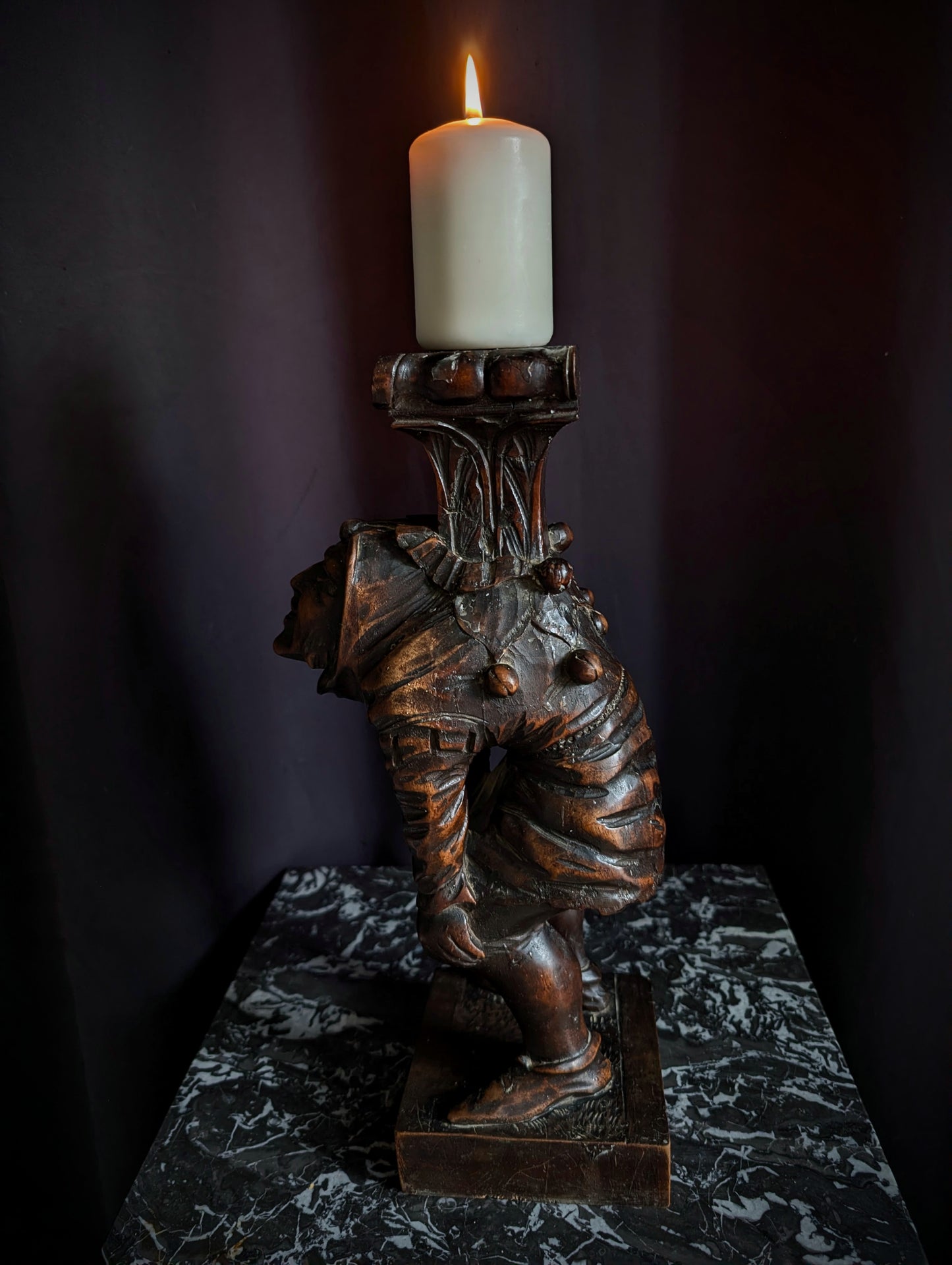 Antique wooden candlestick carved with a hunchback (Quasimodo) from the 19th century (1860s)