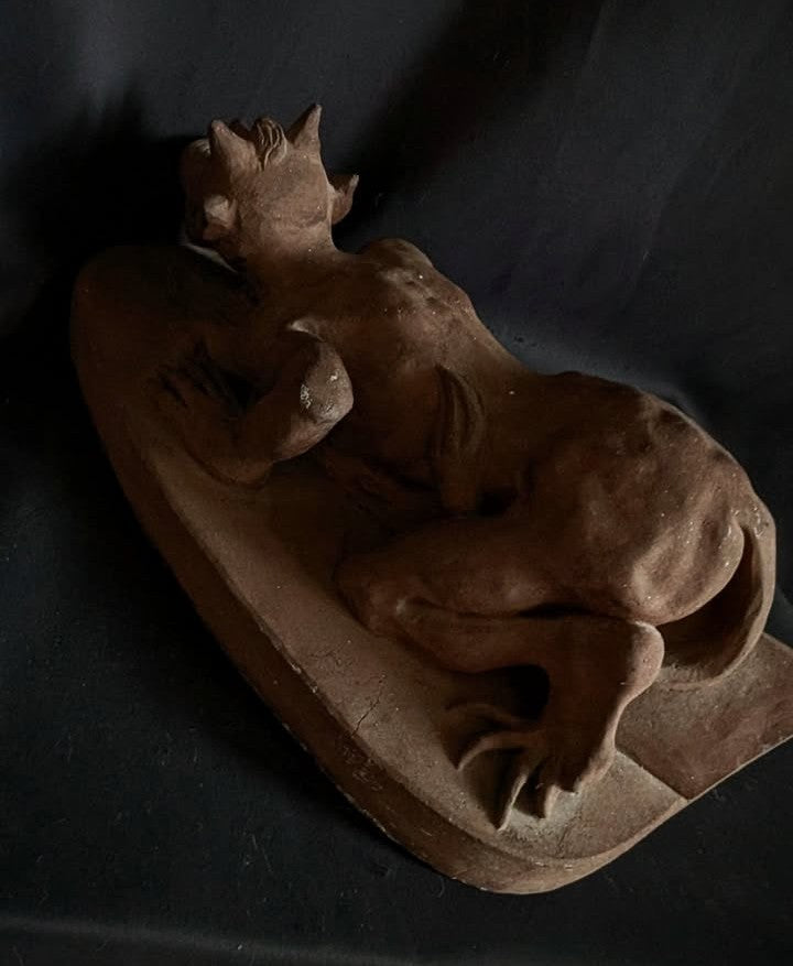 Sculpture of the Devil with a chalice (made of church stone)