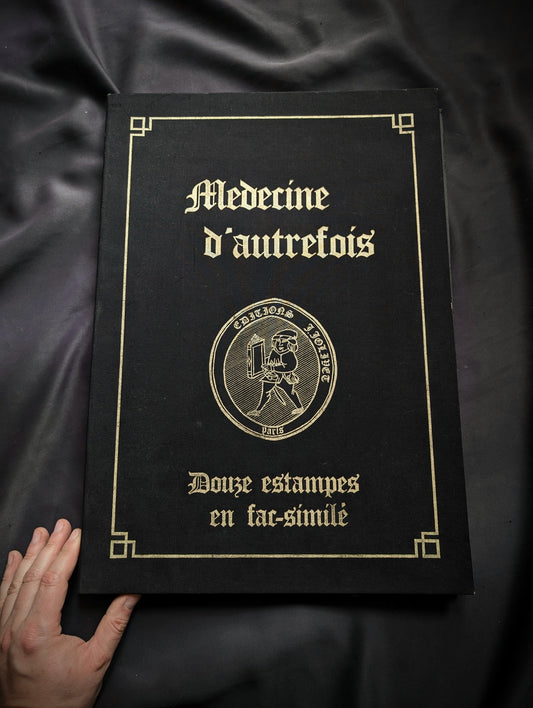 "Médecine d'Autrefois" with twelve prints in facsimile on black paper, size 51x31cm, edition from 1985
