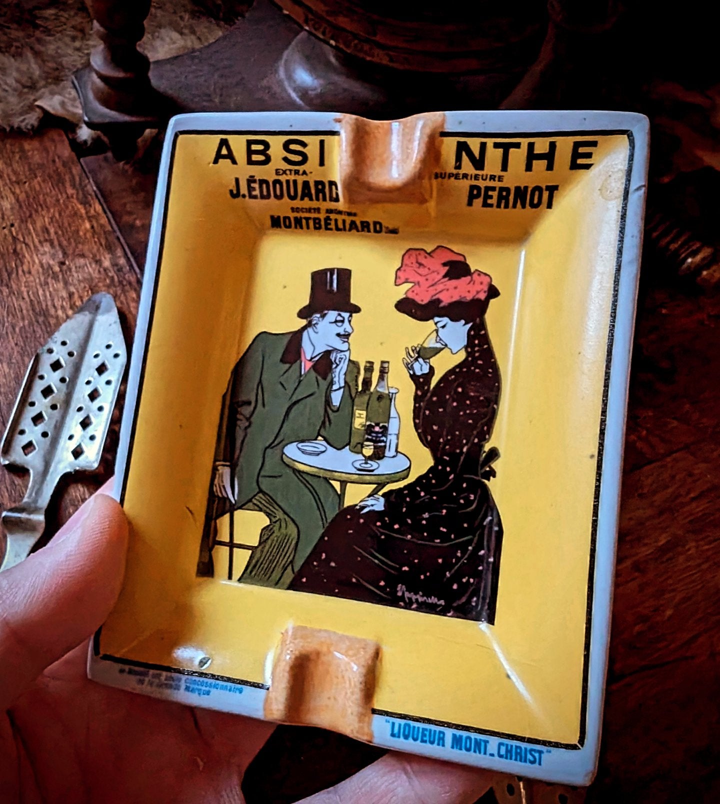 Absinthe Pernot ashtray and two antique spoons from the early 20th