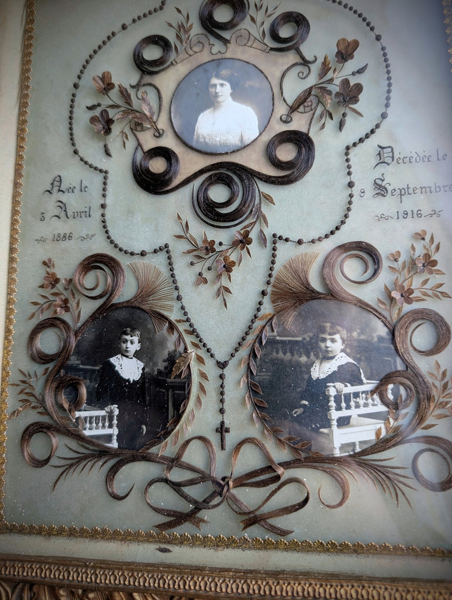 A magnificent antique Reliquary frame containing the hair of a mother and her two children, who passed away in France during the First World War in 1916.