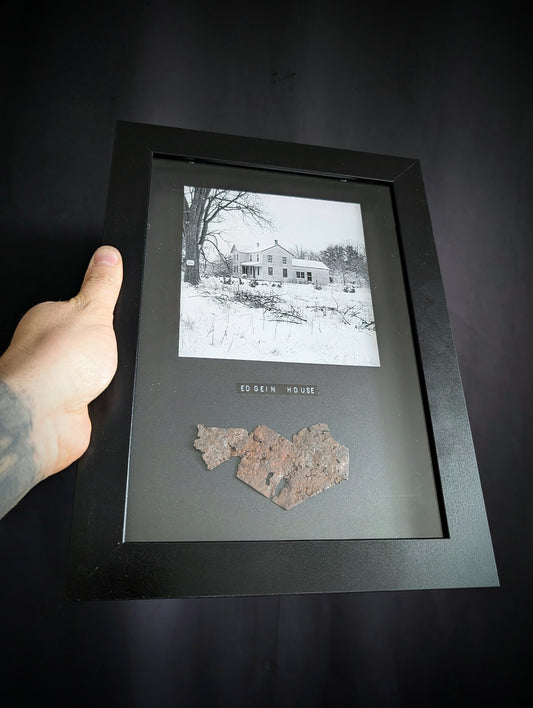 Piece of ED GEIN's infamous farm in a frame with photo