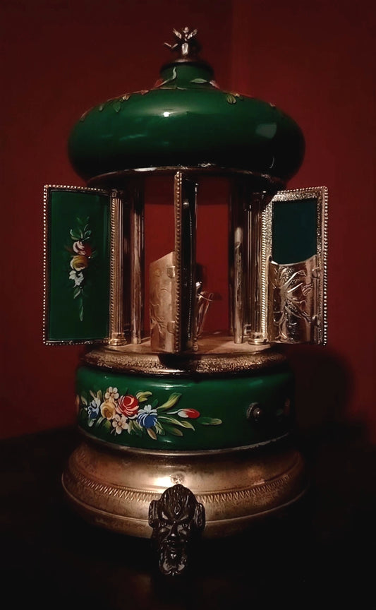 Antique musical cigarette dispenser in the shape of a bandstand