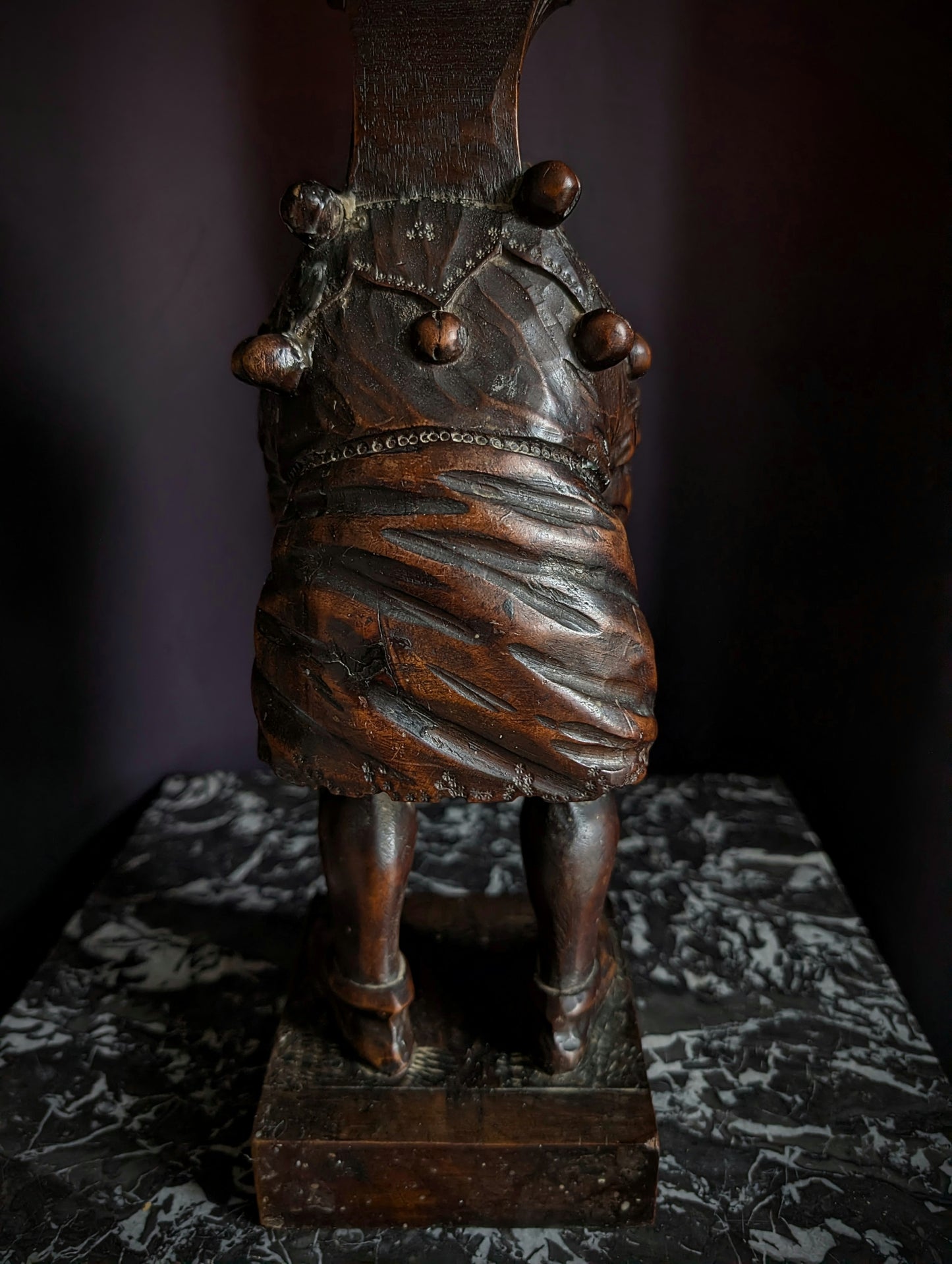 Antique wooden candlestick carved with a hunchback (Quasimodo) from the 19th century (1860s)