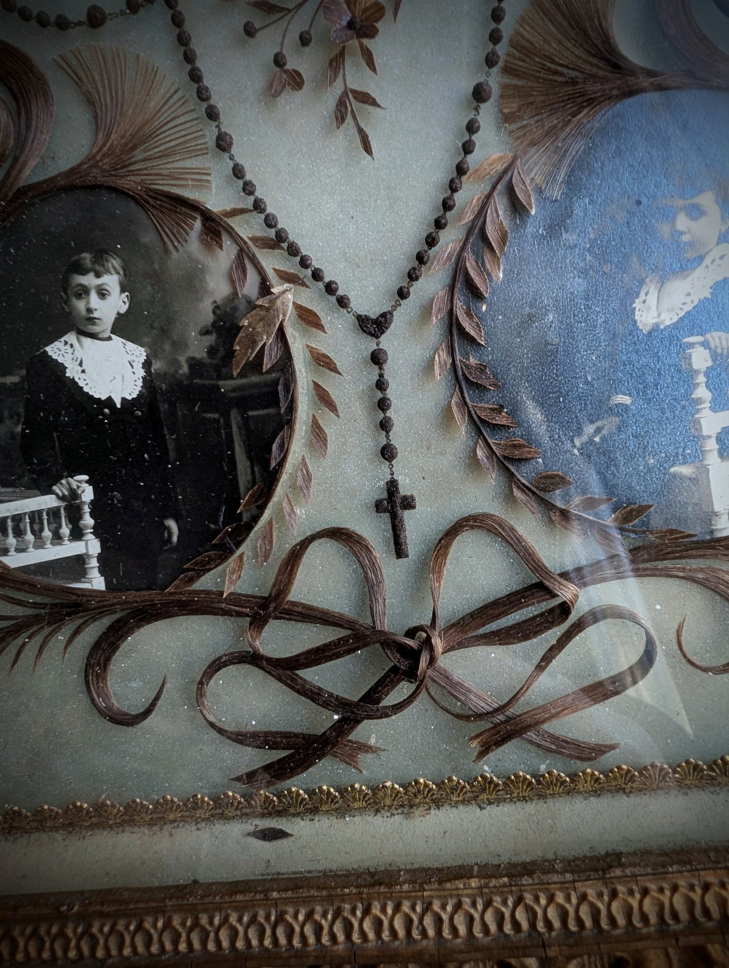 A magnificent antique Reliquary frame containing the hair of a mother and her two children, who passed away in France during the First World War in 1916.
