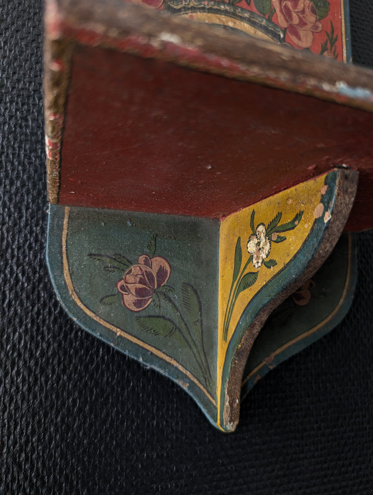 Sectioned skull from a private collection belonging to a doctor in Germany, 1915. Displayed on an antique Alpine folk art painted wooden wall shelf (Bauernmalerei)