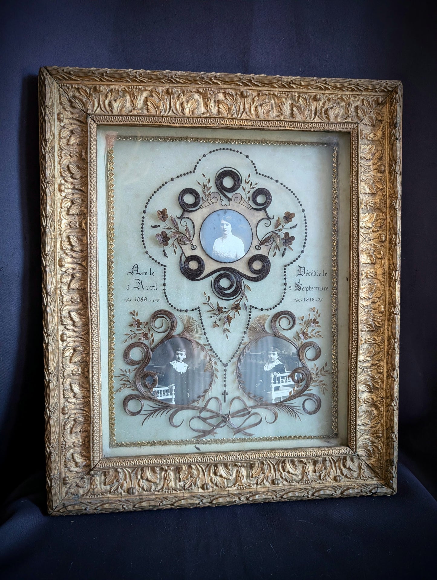 A magnificent antique Reliquary frame containing the hair of a mother and her two children, who passed away in France during the First World War in 1916.