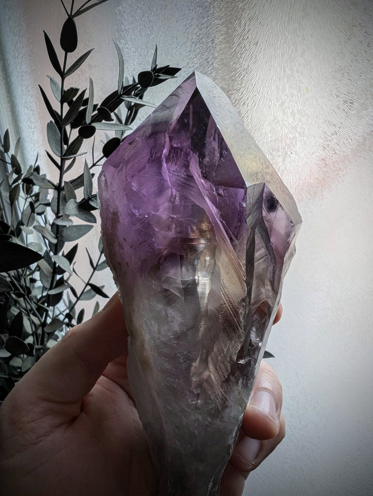 Amethyst Crystal on an Ornate Gilt-Brass Stand