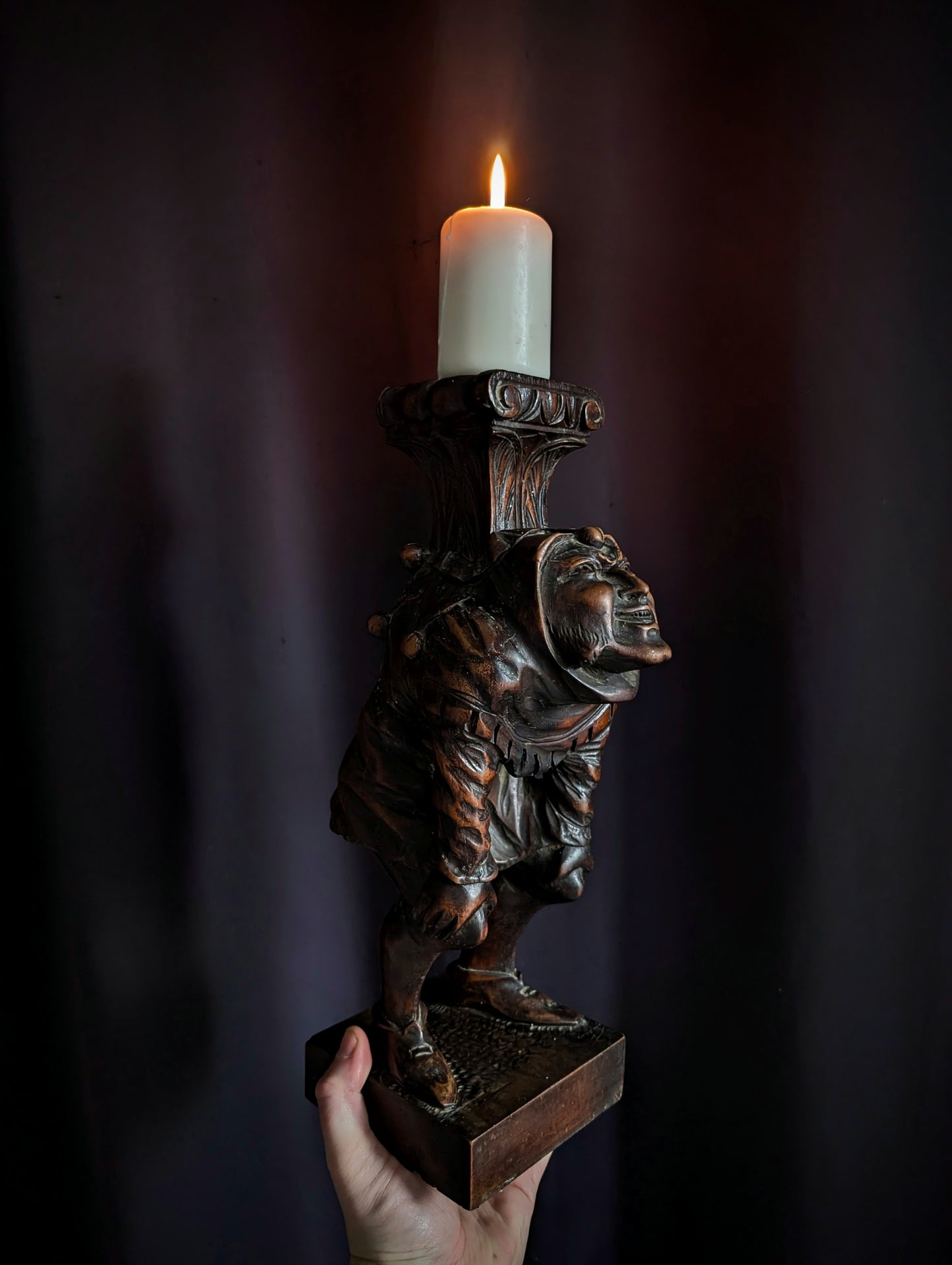 Antique wooden candlestick carved with a hunchback (Quasimodo) from the 19th century (1860s)