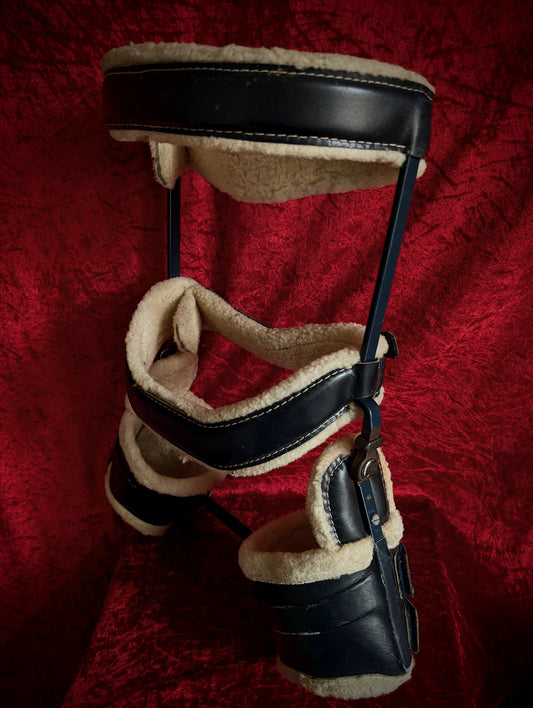 Antique orthopedic brace for child's hips (mid 20th from United kingdom)