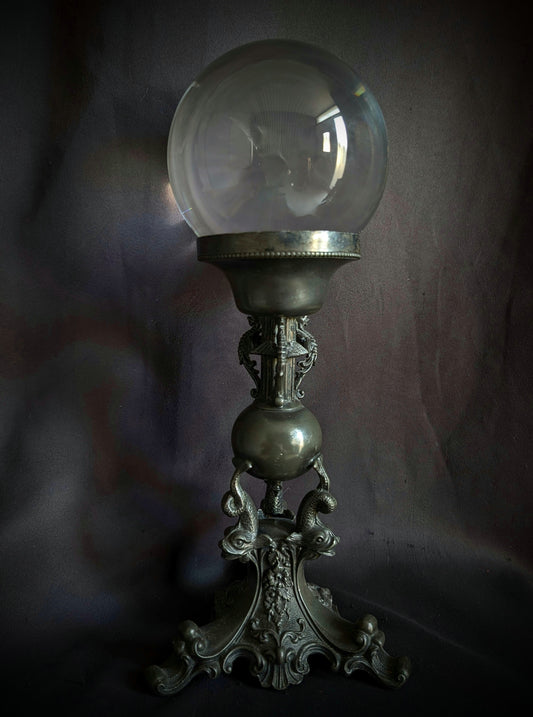 A beautiful crystal ball on a pedestal with Chimeras (30cm)