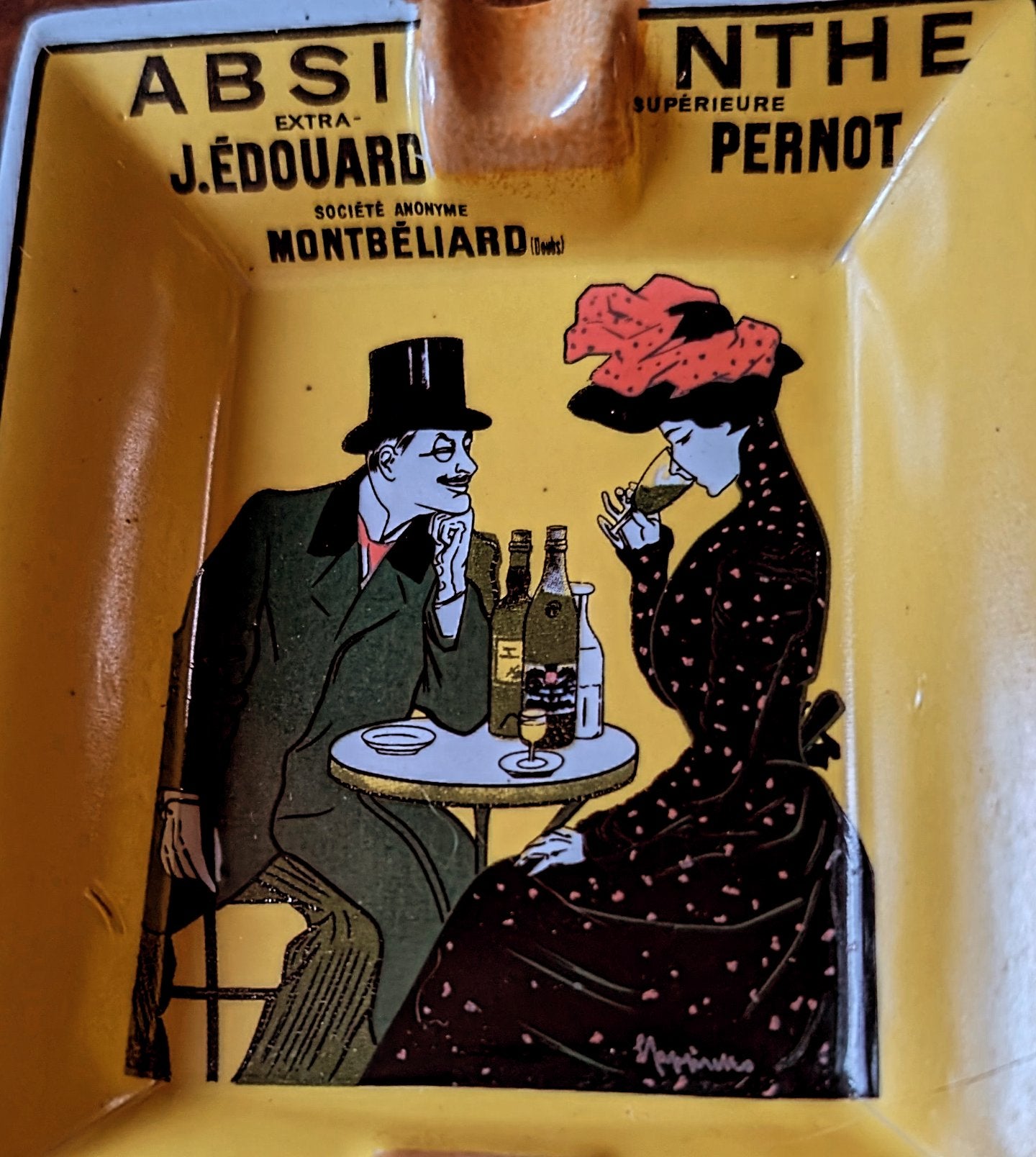 Absinthe Pernot ashtray and two antique spoons from the early 20th